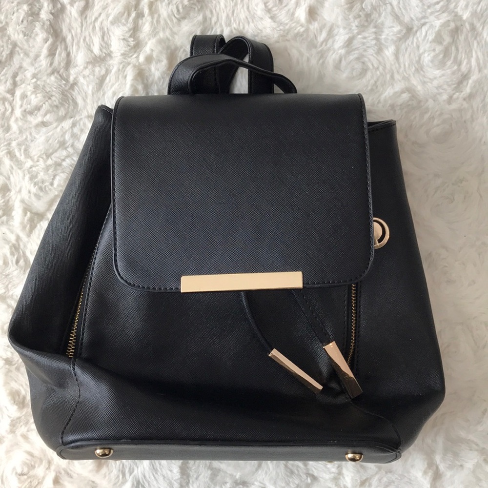 Like new black leather small backpack